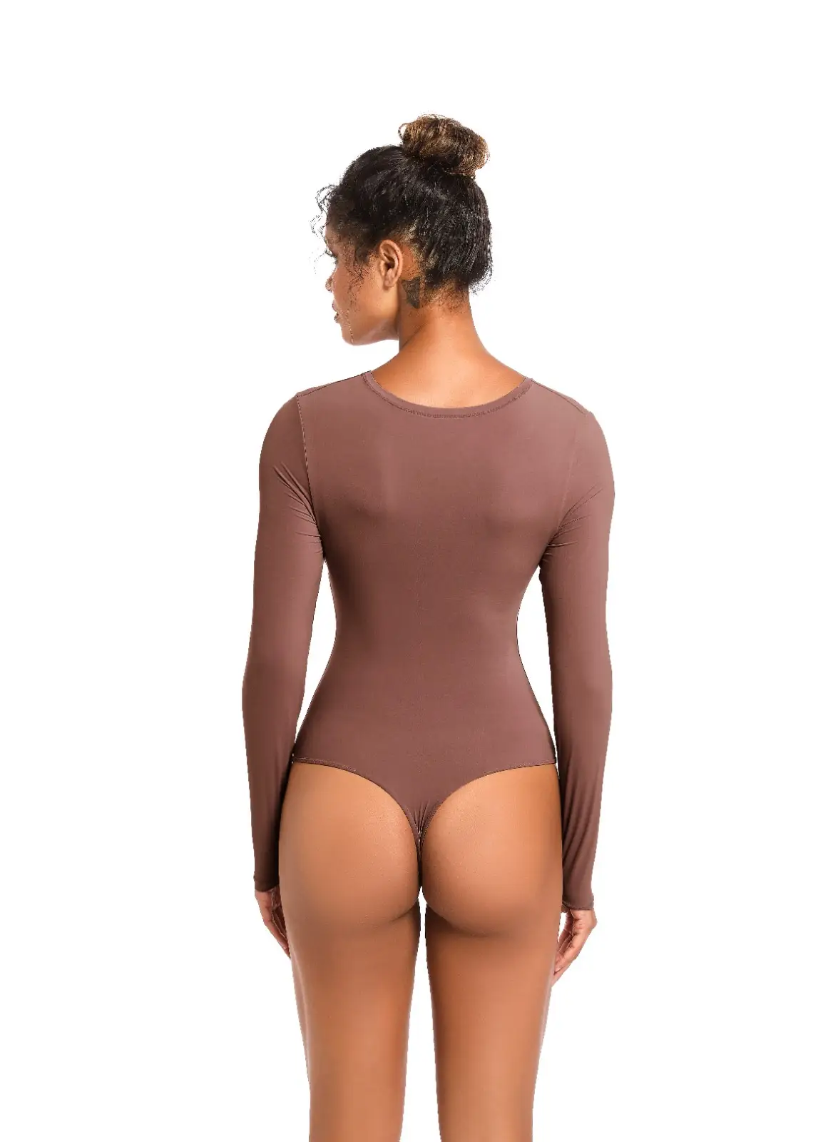 Black woman posing and wearing a brown long sleeve bodysuit backside over a white background.