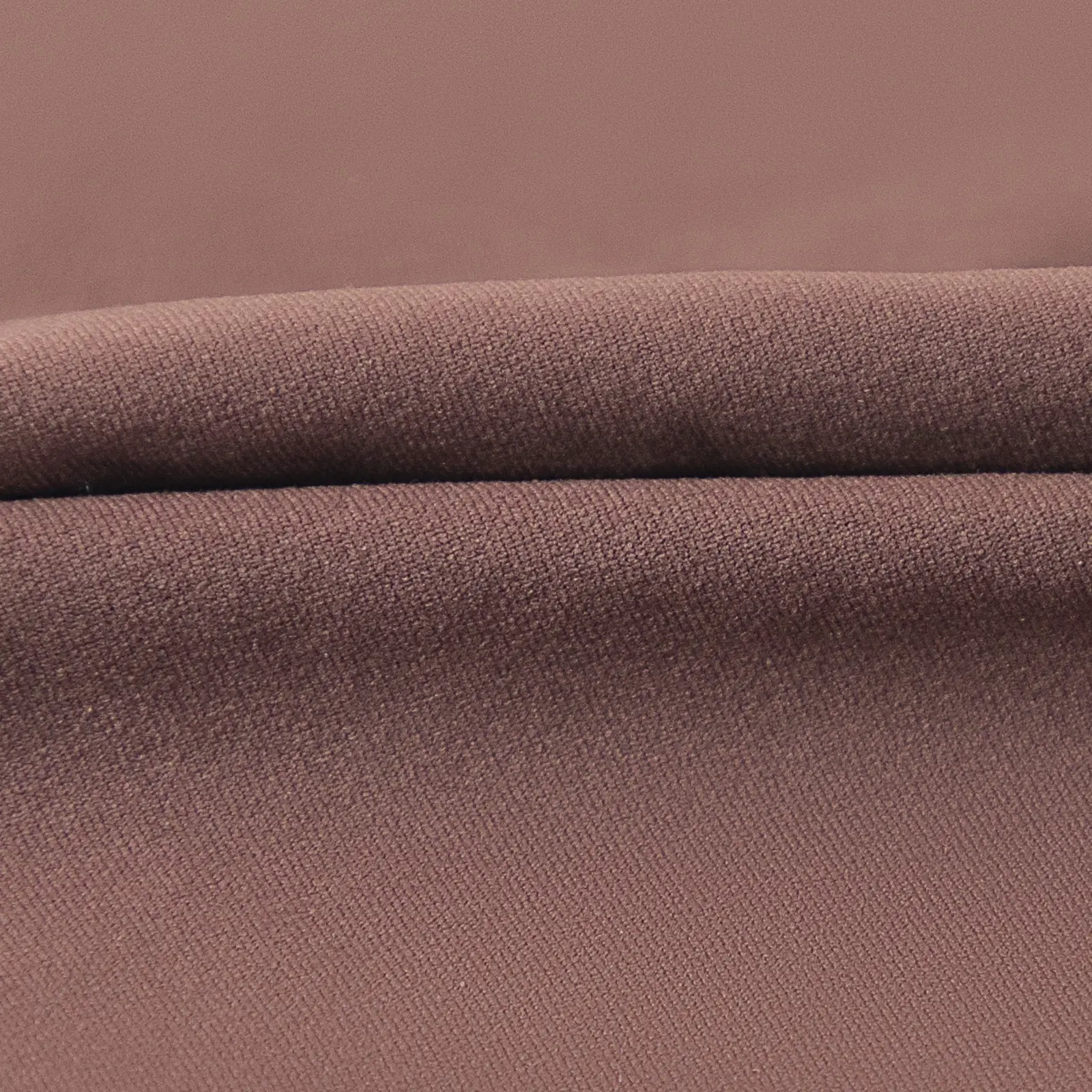 Close-up of folded brown soft fabric.